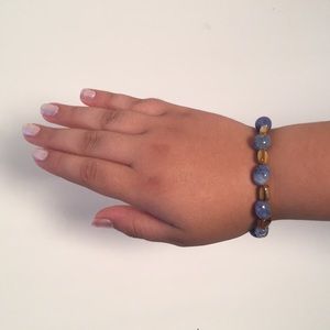 Gold and blue braclet